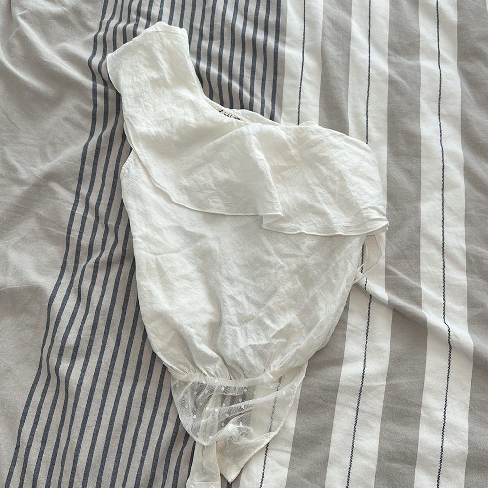 Free people body suit with ruffle!
